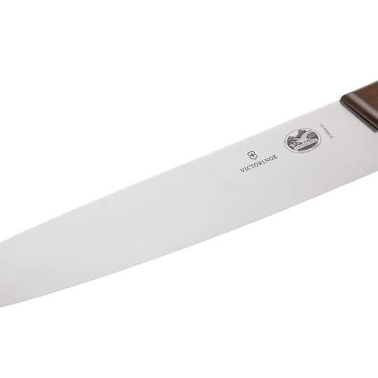 Scherp snijblad van het Victorinox koksmes met houten heft