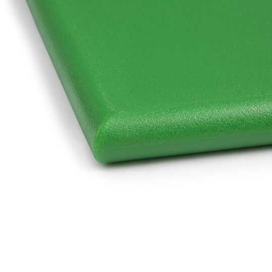Bovenaanzicht van de professionele groene snijplank